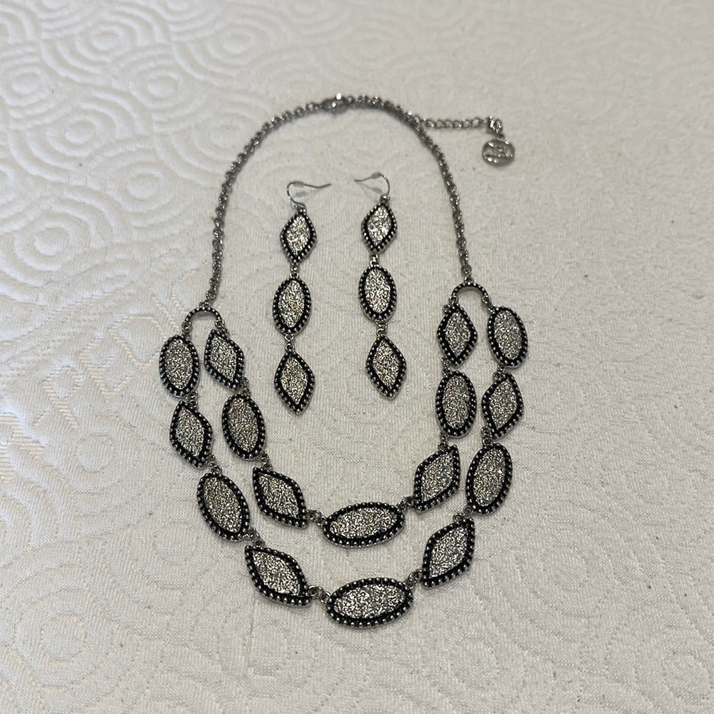 Silver and black necklace with matching earrings